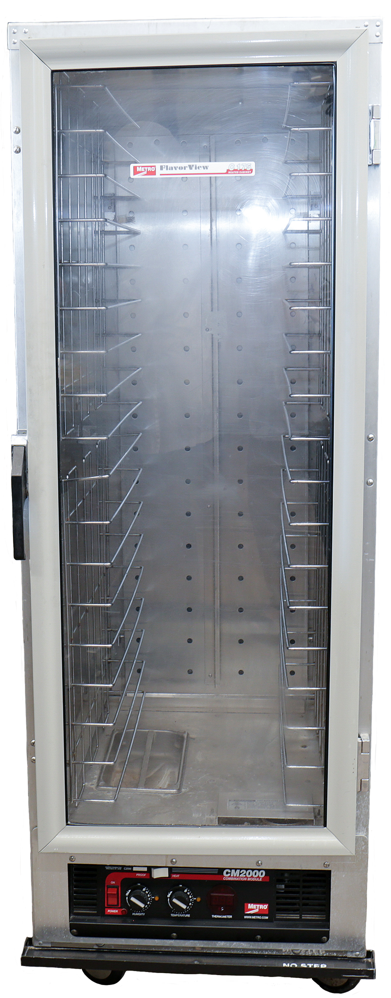Approximately 6 ft. tall made of stainless-steel. One single door that has a panel of glass to view the interior. The front, bottom has a black panel that holds the on and off switch, humidity control, and temperature dial. Through the glass the interior has several thick wire type shelving for holding sheet trays.
