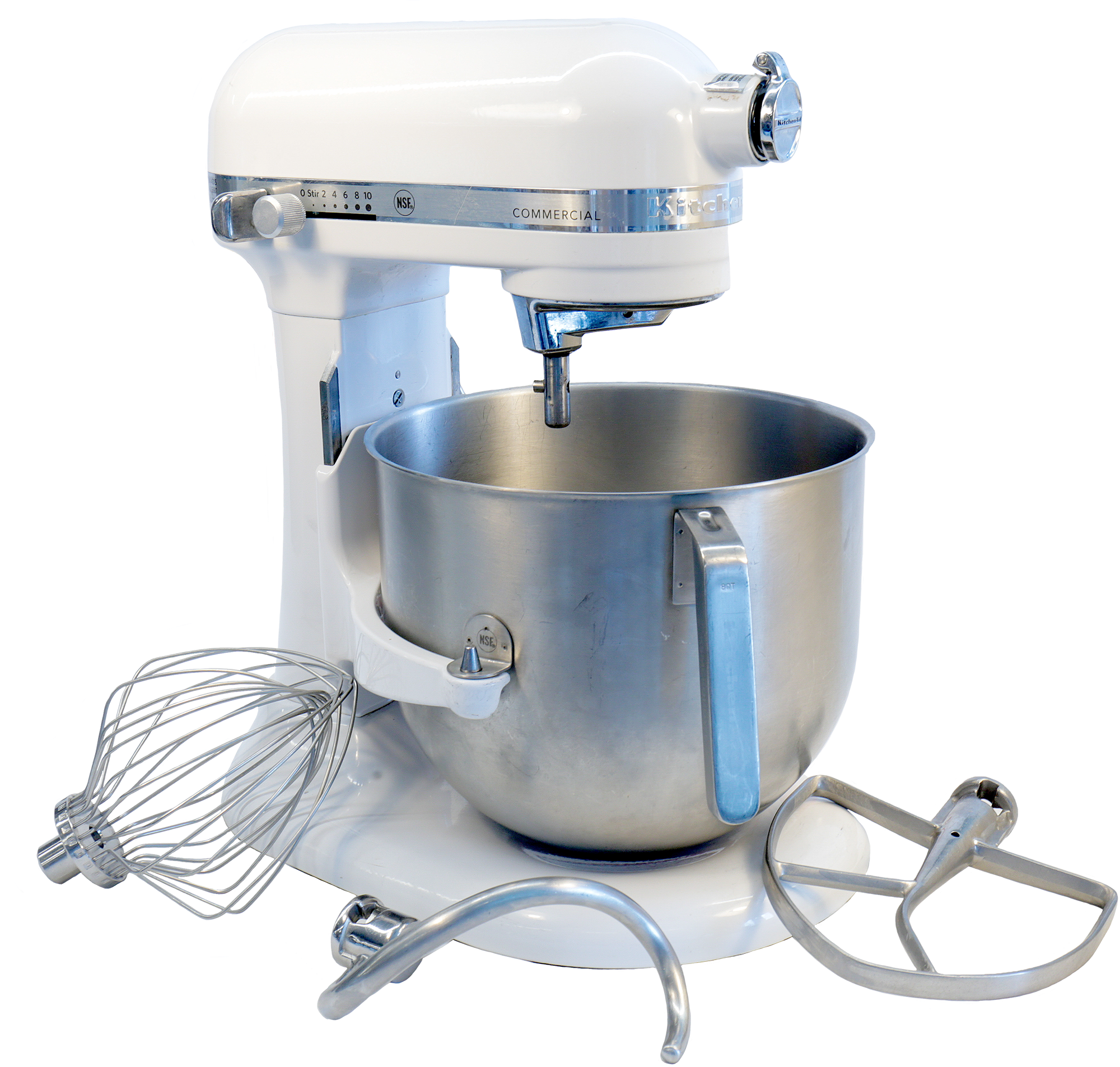 Mixer with its attachments. Stainless-steel mixing bowl, whip, dough hook, and paddle attachments.